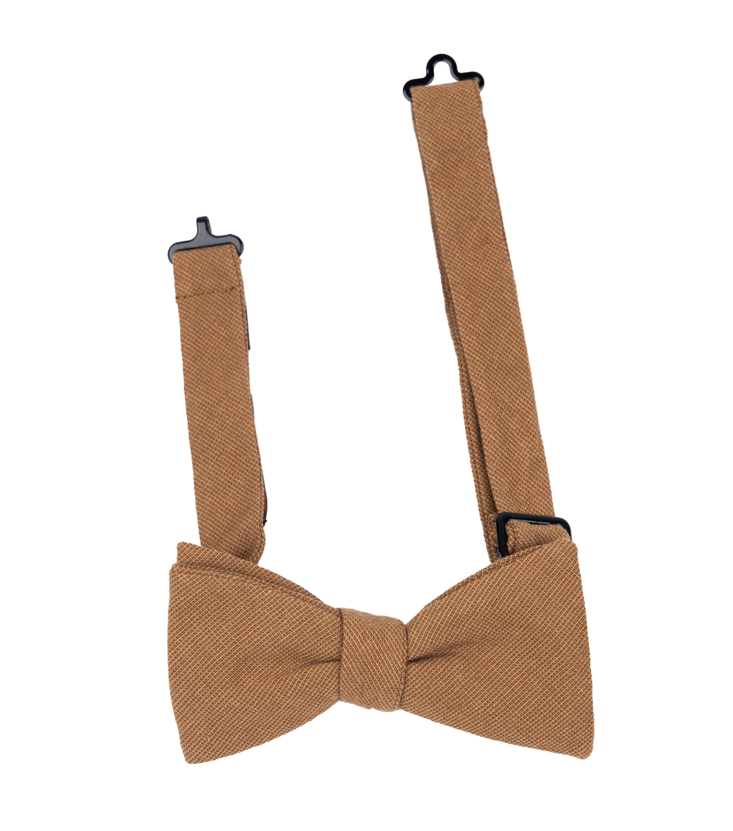 brown braces and bow tie