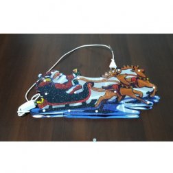 Vánoční multikolor LED dekorace Santa na saních 46 x 21 cm